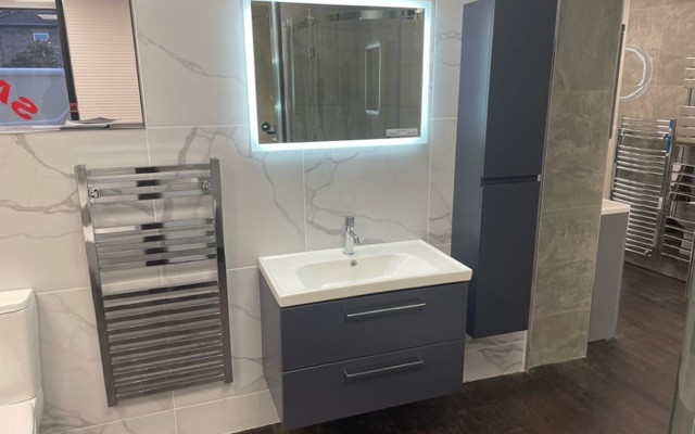 Explore the elegance of our grey vanity unit bathroom display featuring modern finishes.
