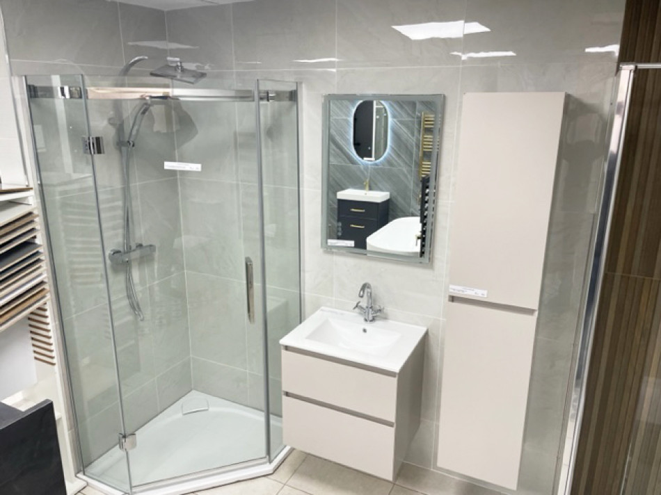 Showcasing our elegant shower cubicle design with integrated storage solutions.